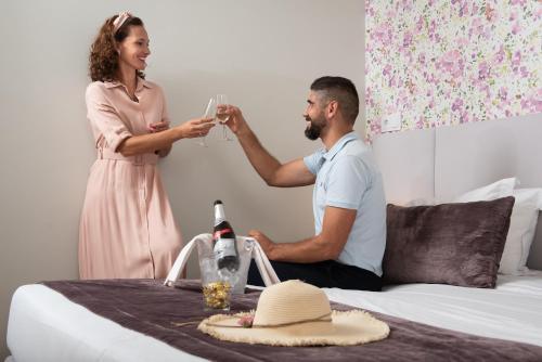 Essence Inn Marianos Hotel