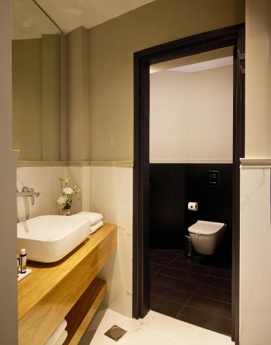 Vrachos Athens Suites - Tap to explore photos