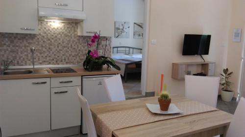 One-Bedroom Apartment with Terrace and Garden View
