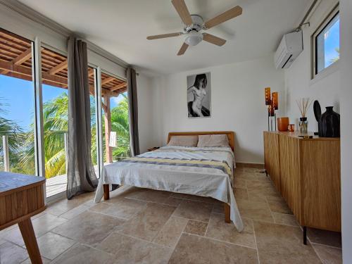 Villa Nadia - Prestige et Confort Absolu avec Vue Imprenable sur la Mer in เลอ ยามัน