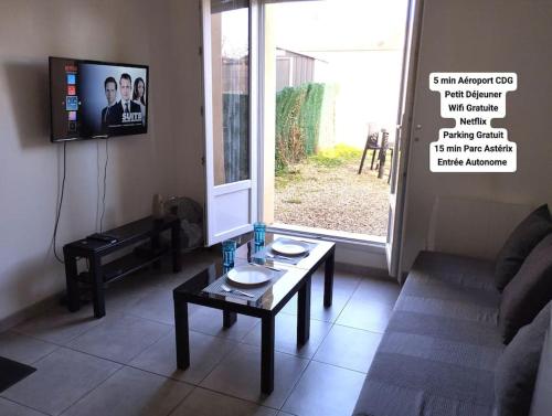 Appartement 2, Jardin, collation, 5 min de l'aéroport CDG