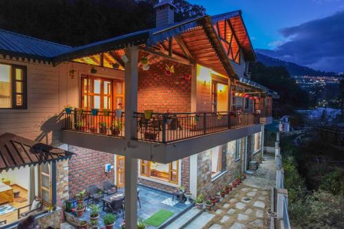 Exterior view of SaffronStays Wood Sparrow - 2BR Pet-Friendly Lakeside & Hill View Cottage for Families