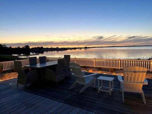 Ferienhaus-Sliminde-by-Seeblick-Ferien-direkte-Wasserlage-E-Ladesaeule-Sauna in Olpenitz