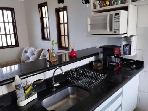 virtuve, Casa 2 qtos, sendo suíte com cama Queen ar condicionado (Casa 2 qtos, sendo suite com cama Queen ar condicionado) in Guapimirim