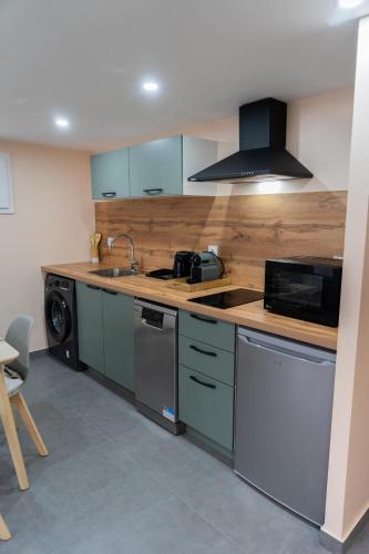 кухня, Appartement Cosy Le Lys Vert à 40mn de Paris (Appartement Cosy Le Lys Vert a 40mn de Paris) in Дамари-ле-Лис