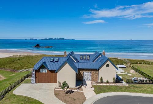 Beachfront Paradise - Opito Bay Holiday Home