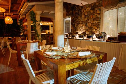 Restaurante, Villa Kapresse du 978 - Guest house in Ilha de São Martinho