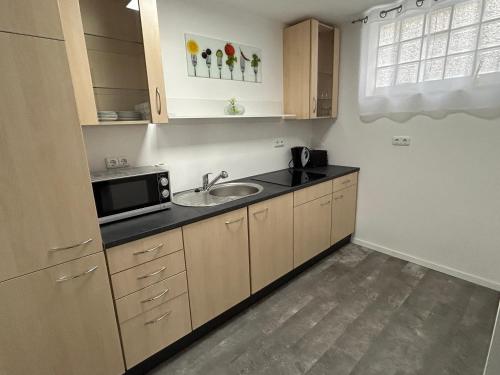 Ferienwohnung an der Zaunlücke (Ferienwohnung an der Zaunlucke) in เฮลม์สตัดท์