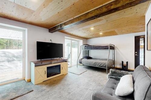 Alpine Modern A-Frame - Tap to explore photos