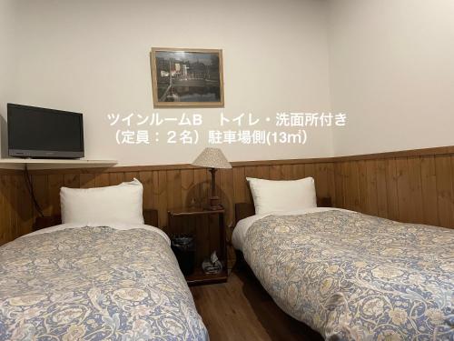 ゲストハウス クロイツェルツインルーム　共用バスルーム　