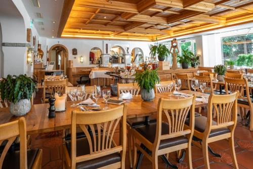 Restaurant, Studio im Hotel Des Alpes in Flims