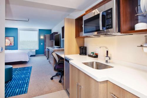 Közös társalgó / TV, Home2 Suites by Hilton Grand Rapids South in Wyoming (Michigan)