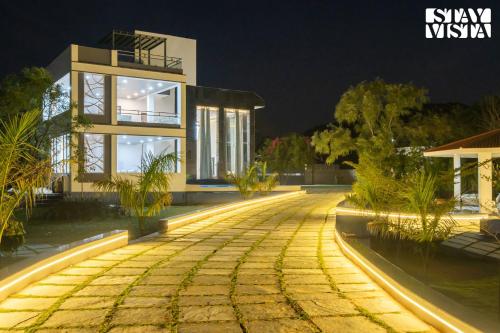 StayVista's Avadh Vatika - Mountain-View Villa with Outdoor Pool, Lawn featuring a Gazebo & Bar