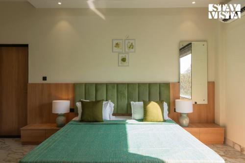 StayVista's Avadh Vatika - Mountain-View Villa with Outdoor Pool, Lawn featuring a Gazebo & Bar