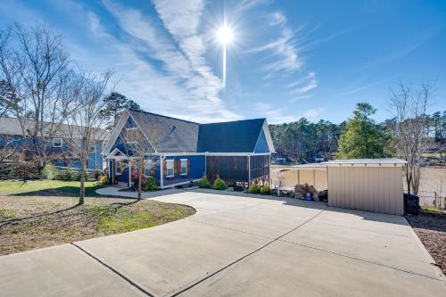 Lakefront New London Retreat with Dock and Hot Tub!