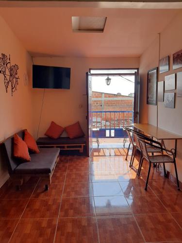Koplietošanas atpūtas telpa ar TV, Km0 Hostel in Salento