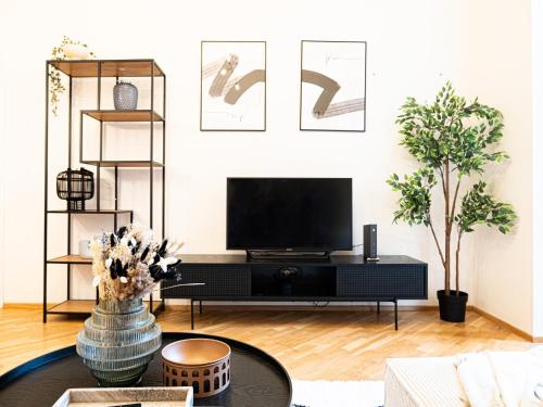 Rentero Cozy Industrial 8min Dancing House Apartment, Prague, Prag (Foto 4)