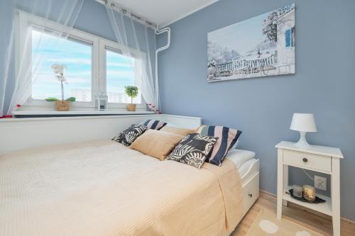 . Pastel Blue Studio in Łódź with Balcony and Separate Kitchen by Renters