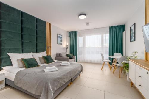 Family Studio room in Aquamarina Prima Holiday Studios by the BEACH by Noclegi Renters