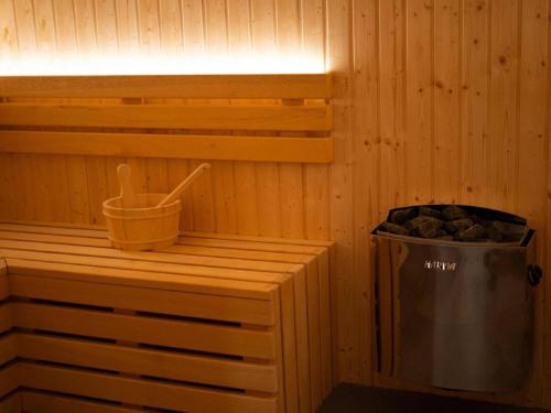 Nice holiday home with fireplace located in nature - image 12