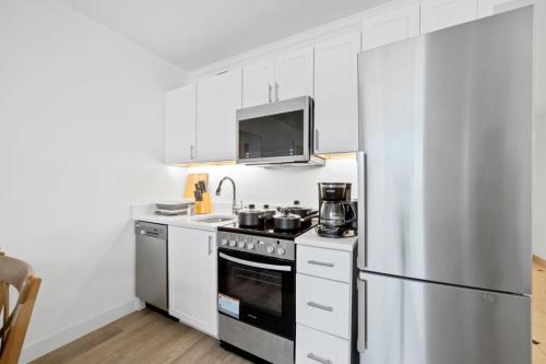 CozySuites TWO Separate Stylish Ocean Front Condos - image 10