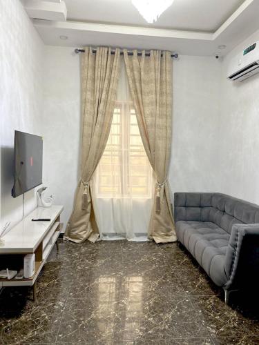 Shared lounge/TV area, Urban Haven in Lekki