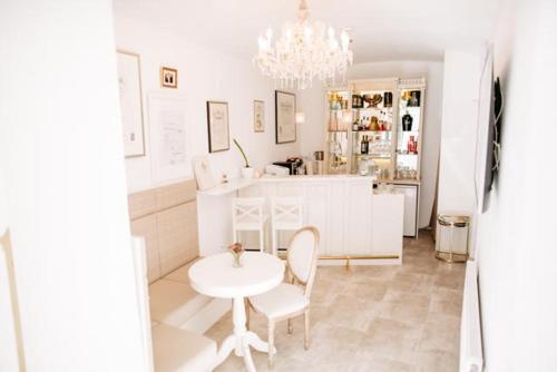 공용 라운지/TV 시청 구역, Boutique Hotel Goldenes Lamm Villach in 필라흐