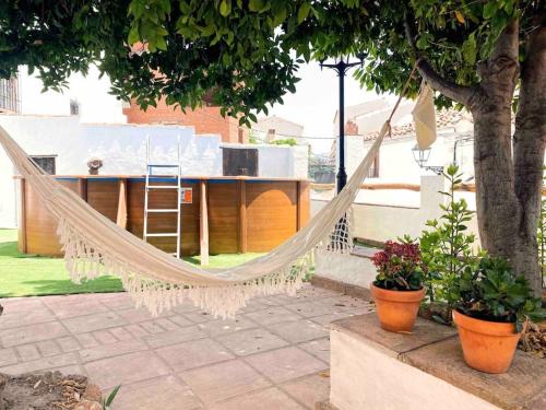 La Palmera. Casa rural con piscina privada. in Benadalid
