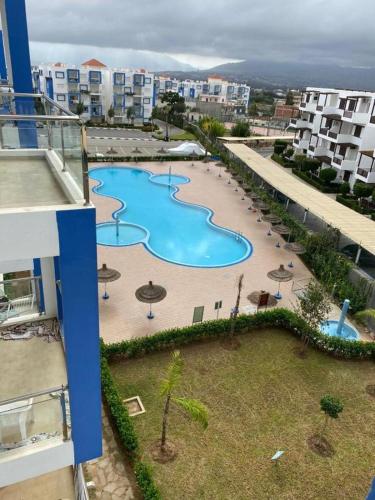 Плувен басейн, Superbe appartement au centre de Cabo Negro en résidence avec piscines et tobogan (Superbe appartement au centre de Cabo Negro en residence avec piscines et tobogan) in Cabo Negro