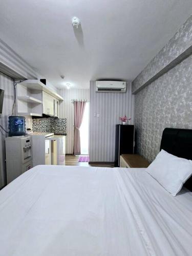 B&B Jakarta - Apt Bassura Studio Tower F w/ Pool, Wi-Fi & Netflx - Bed and Breakfast Jakarta