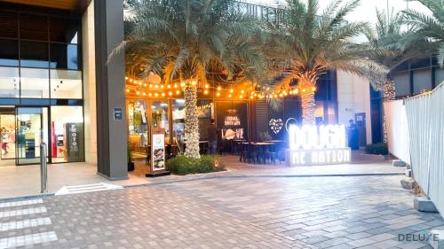 View, Exquisite 4BR Townhouse at DAMAC Hills 2, Dubailand by Deluxe Holiday Homes in Damac Hills 2