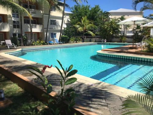 Beautiful appartement with large pool near the beach, Mauritius