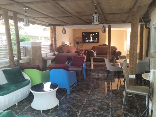 Pub/Lounge, Dazzle Hotels and Apartments Riverpark near Nnamdi Azikiwe nemzetközi repülőtér