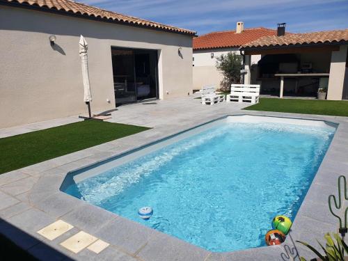 Villa de 3 chambres avec piscine privee jardin clos et wifi a Pia - Location, gîte - Pia