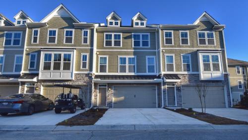 Newly built open-concept and beautifully decorated 4 Bedroom in Barefoot Resort 802 Dye Townhome