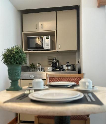 Kitchen, Suites del Bosque Hotel in Lima
