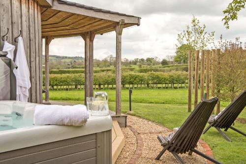 Nether Farm Roundhouses - Henmore Water & Sturston Winds with hot tubs - Bradley Wood no hot tub in Offcote