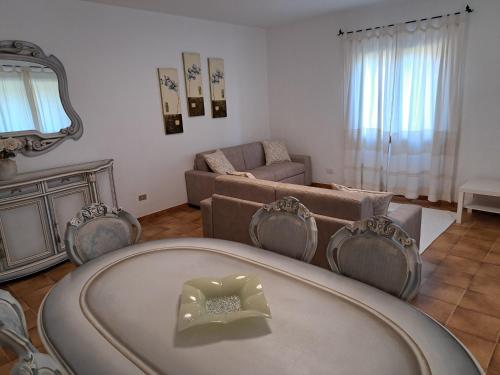 Skupni salon/TV območje, Gli Olivastri Guest House in Cudacciolu