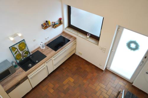 Konyha, Charmantes Maisonette-Appartment in Chorweiler