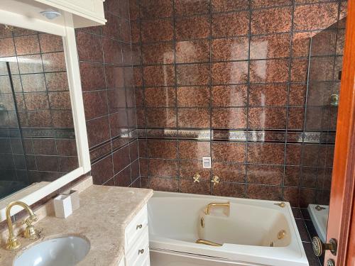 Quarto no centro com 2 camas e hidromassagem