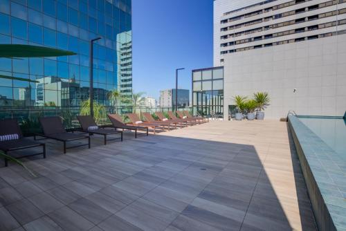 Swimming pool, Qoya Sao Paulo Paulista, Curio Collection by Hilton in Vila Mariana