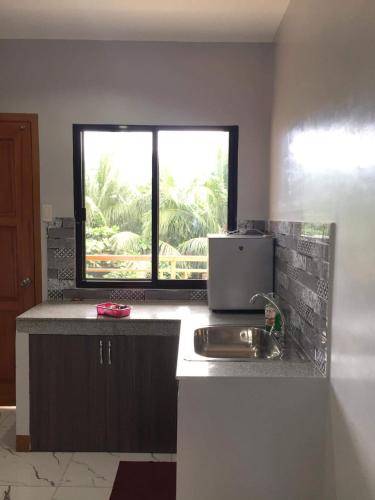 Kitchen, Mgf Franz Pension House in Bogo City