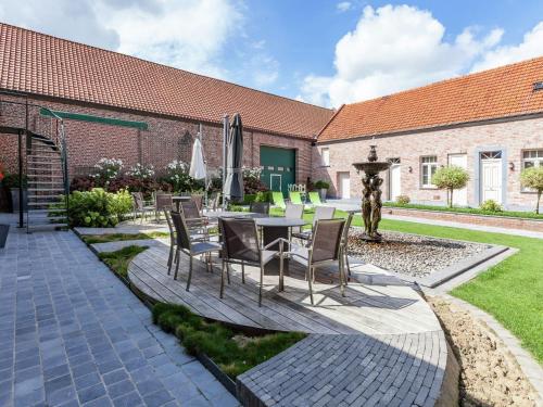 Large cottage overlooking the sunny courtyard with fountain