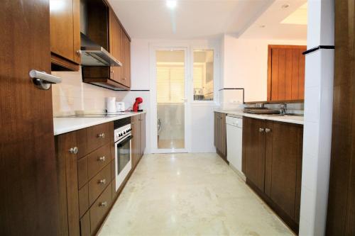 dapur, Apartamento con piscina y playa cercana en Torrevieja, area de Punta Prima AQ-125 in Punta Prima