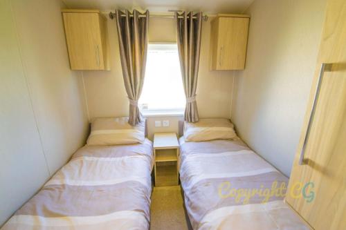 SBL54 - Camber Sands Holiday Park - Mini Lodge - 3 Bedrooms - Decking - Dishwasher - Private Parking, Camber (foto 9)