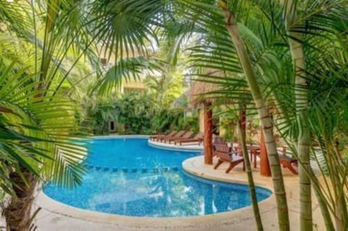 Condo Complex with an Alluring Pool & Tropical Vibes by Stella Rentals photo 1