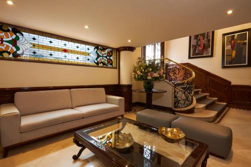 jaettu olohuone/TV alue, Hotel Saint Simon in Bogotá