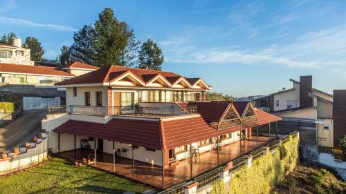 ทัศนียภาพภายนอกโรงแรม, The West Wind by StayVista - 5BHK Mountain-View Villa with Bonfire in แฮฟลอค