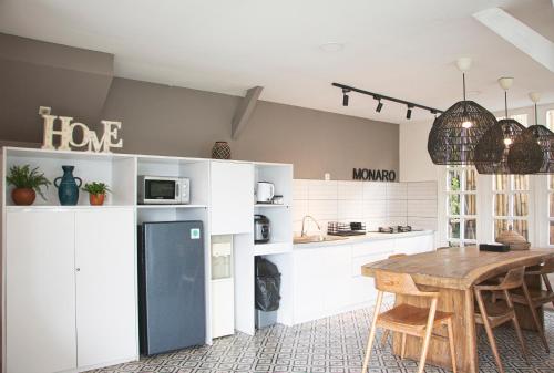 Villa Memory - Modern white open kitchen near Taman Safari Cisarua