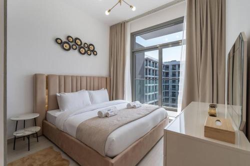 Stylish 1BR Retreat in Laya Heights, Studio City, Dubai (Foto 3)